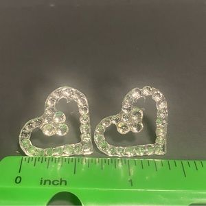 They are resin and rhinestone inspired heart shape earrings lightweight and fun
